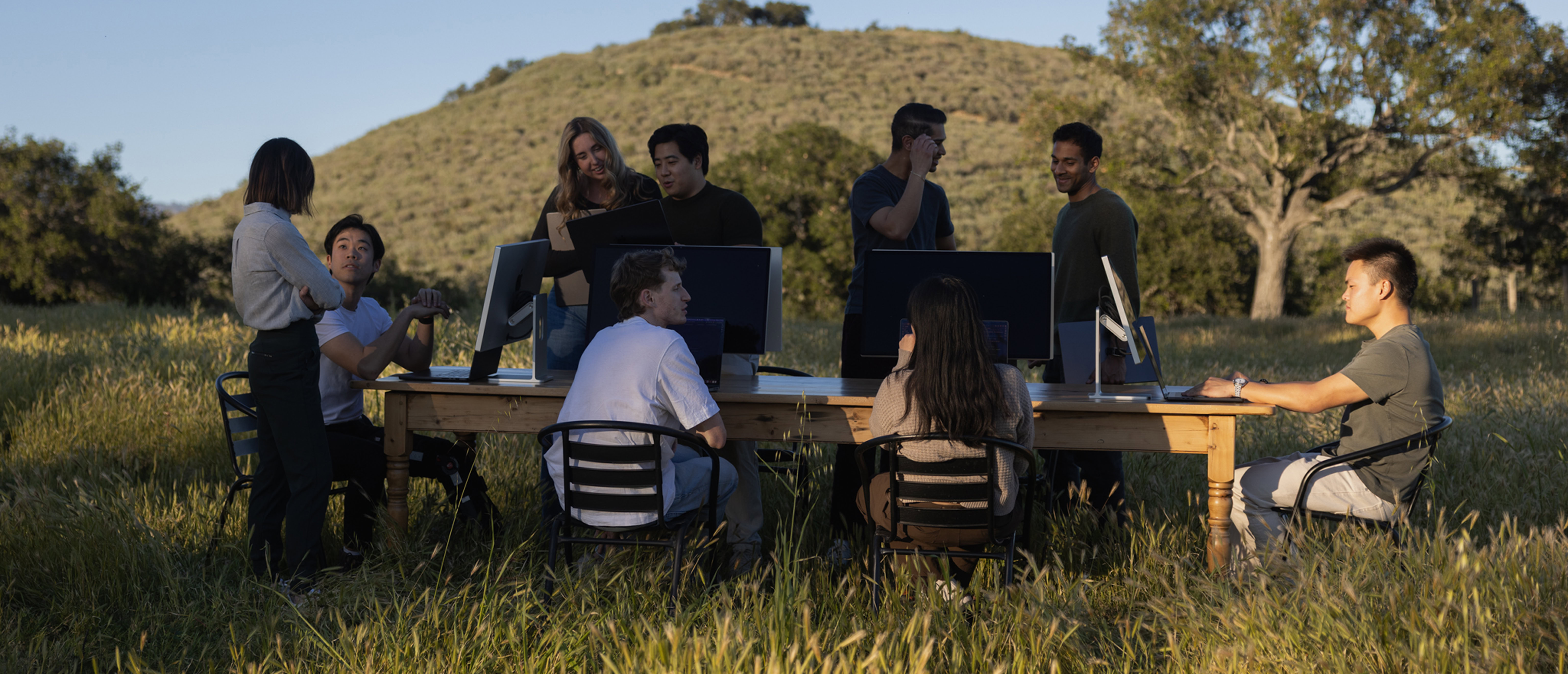 The Natural team working together outdoors